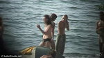 Chubby sissy walks along public beach and plays in the water_0bea85c9