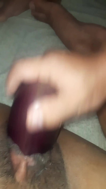 Rosni is fingering & inserting Brinjal in her hot pussy.