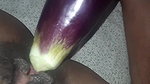 Rosni is fingering & inserting Brinjal in her hot pussy.