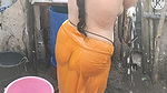 Anita yadav bathing outside with hot