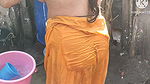 Anita yadav bathing outside with hot