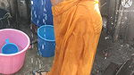 Anita yadav bathing outside with hot