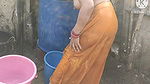 Anita yadav bathing outside with hot