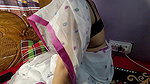 Beautiful Bangladeshi girl wearing a saree showing off her beautiful figure
