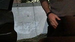 A girl in nature punishes a guy in the balls