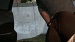 A girl in nature punishes a guy in the balls