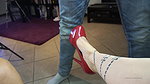 Two dominant mistresses humiliate a slave