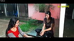 Two hot young girl enjoying in rain scene making