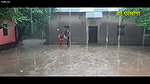 Two hot young girl enjoying in rain scene making