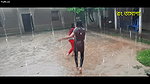 Two hot young girl enjoying in rain scene making
