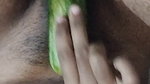 Busty bitch playing with herself and fucking herself with a cucumber