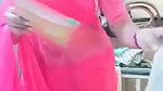 Swathi naidu in pink saree getting ready