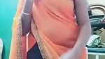 Swathi naidu sexy and romantic seducing in orange saree