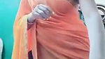 Swathi naidu sexy and romantic seducing in orange saree