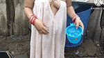Anita yadav bathing outside with hot boobs